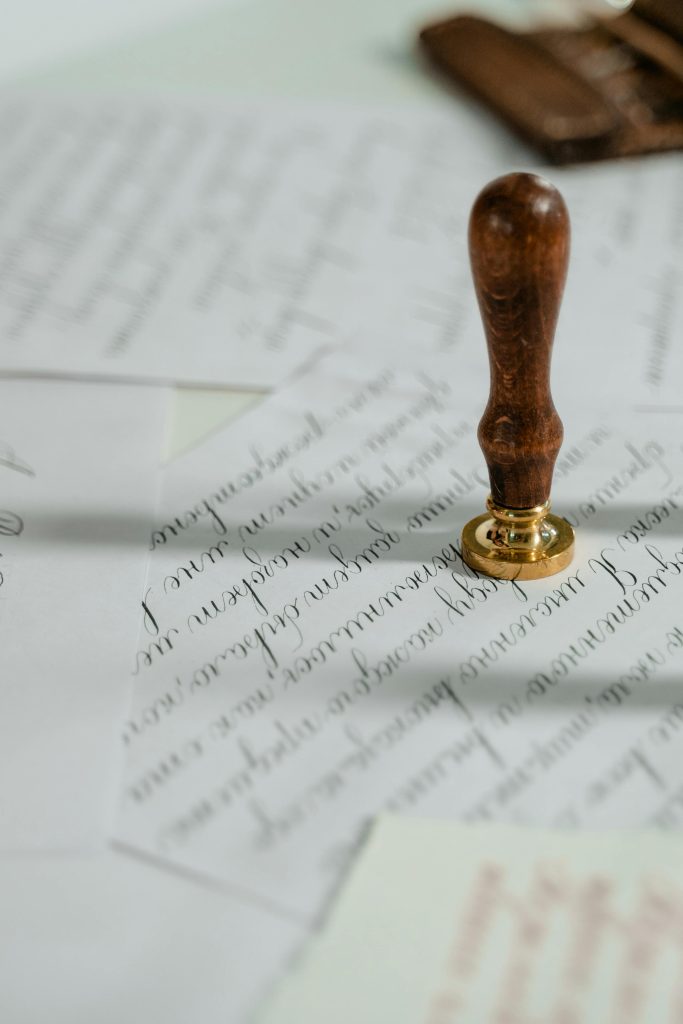 pexels-photo-7333505-7333505 Wooden Wax Seal Stamp on Paper