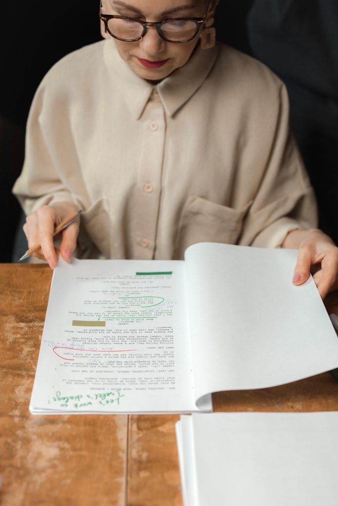 pexels-photo-7967580-7967580 Professional Drama Professor looking at a Script